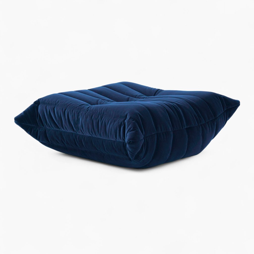 Luxury Caterpillar Velvet Ottoman footstool in plush velvet with ergonomic segmented design