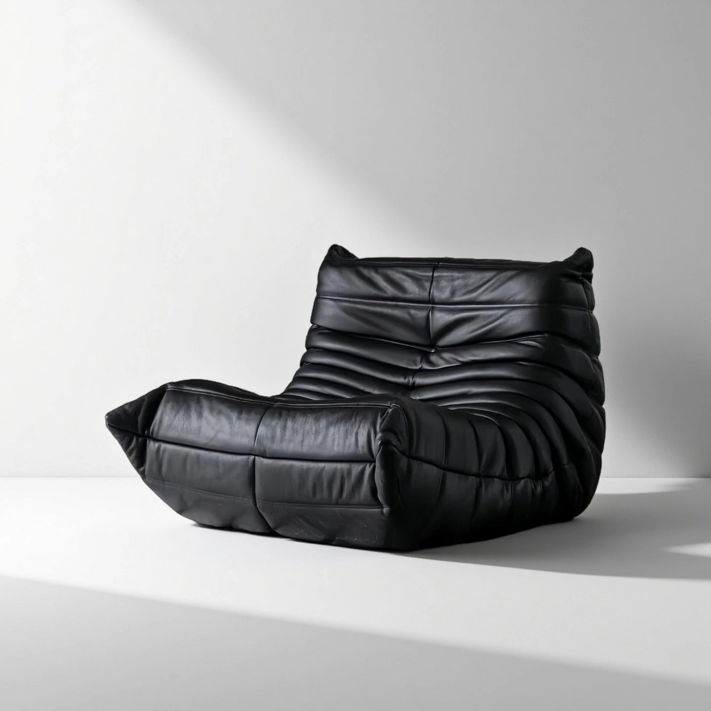 Caterpillar Leather Lounge Chair in plush brown leather with frameless, armless design and hand-tufted detailing