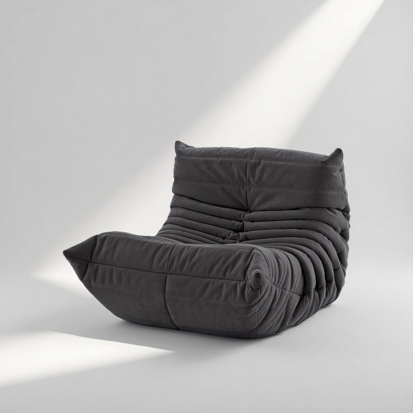 Caterpillar Lounge Chair cozy armless fabric seat in nine colors with foam cushioning