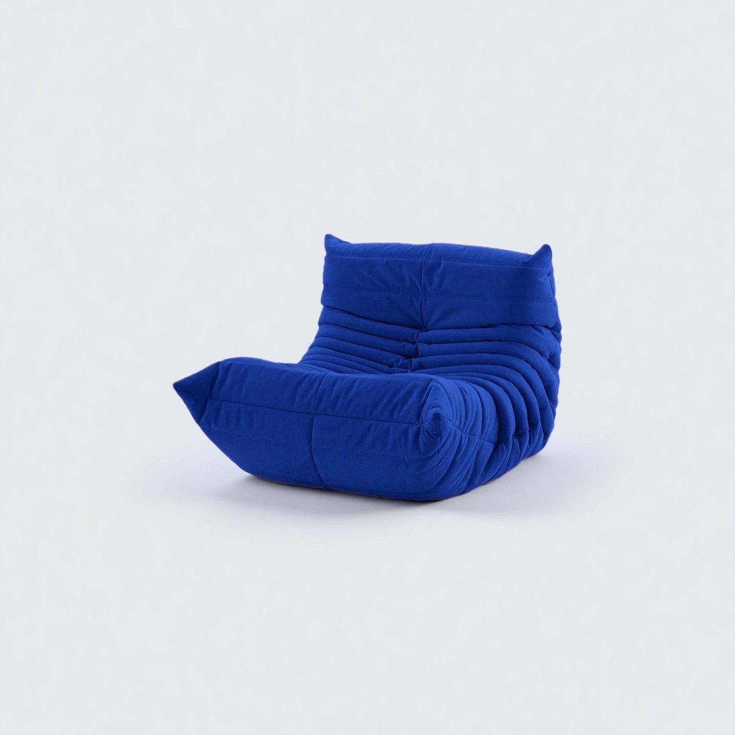 Caterpillar Lounge Chair cozy armless fabric seat in multiple colors with wave-like design and high-density foam cushioning