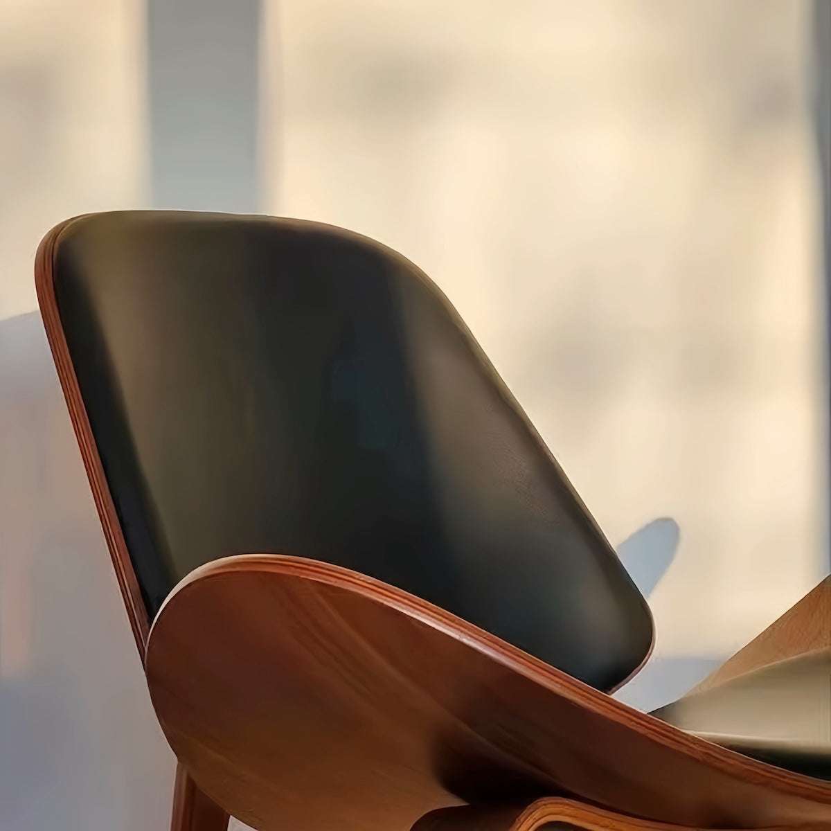 Sculptural Shell Lounge Chair – Genuine Leather & Curved Wood Accent Seat