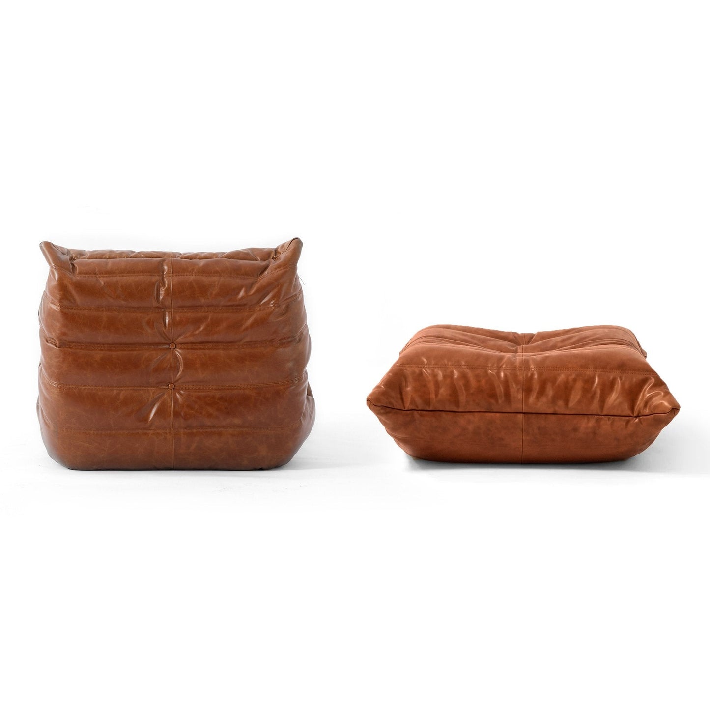 Caterpillar Lounge Chair and matching footstool upholstered in beige suede with smooth, curved design and plush foam padding