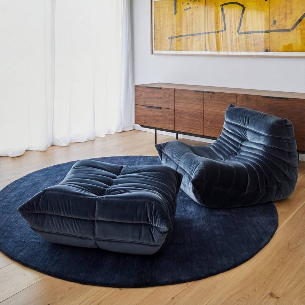 Luxury Caterpillar velvet ottoman footstool with Togo-inspired segmented design and plush velvet upholstery