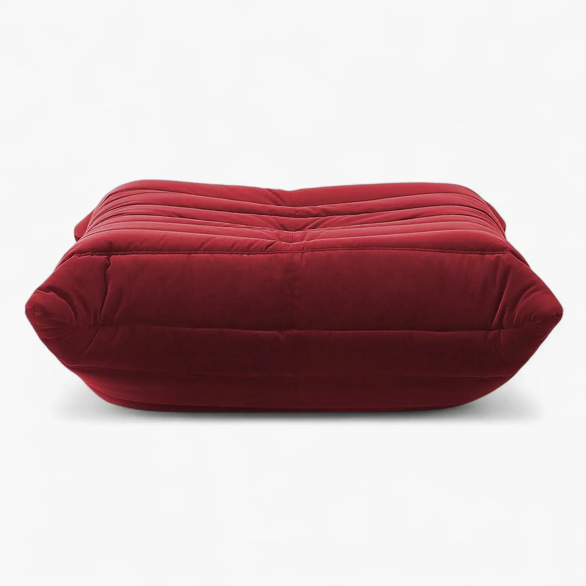Luxury Caterpillar Velvet Ottoman footstool in soft velvet with ergonomic segmented design