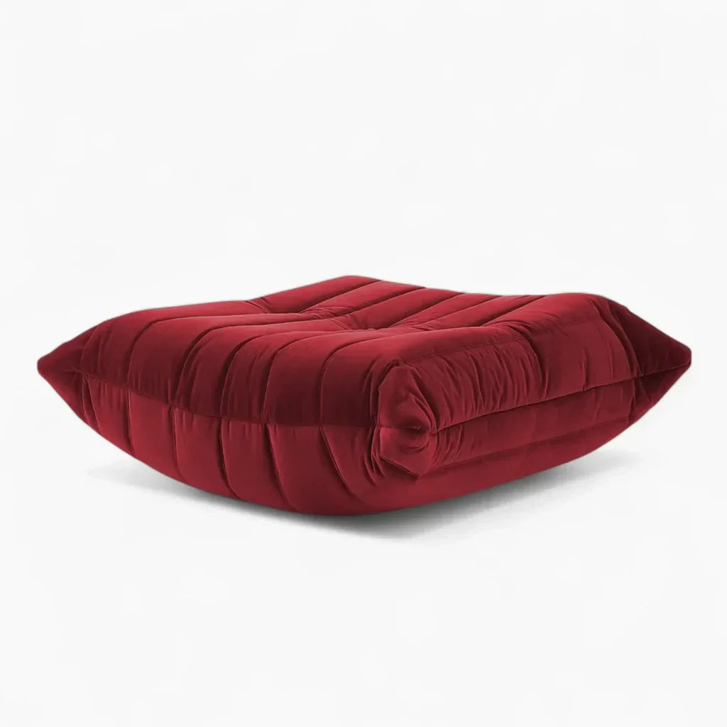 Luxury Caterpillar Velvet Ottoman footstool in plush velvet with segmented ergonomic design