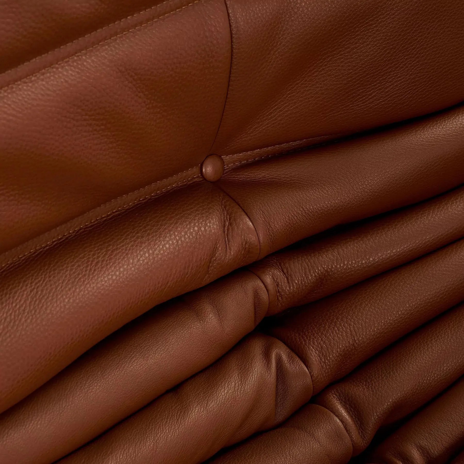 Caterpillar Fireside Chair leather armchair with frameless foam construction and premium upholstery