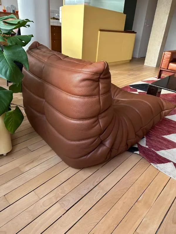 Caterpillar Fireside Chair leather armchair with frameless high-density foam and vintage design