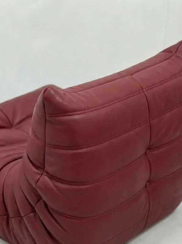 Caterpillar Fireside Chair leather armchair with frameless foam design and premium upholstery