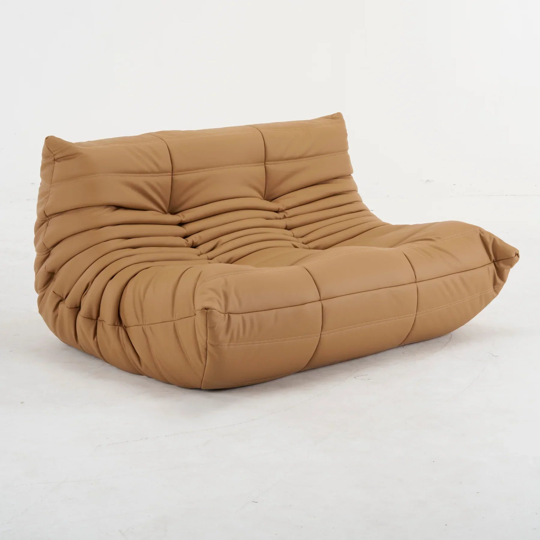 Plush leather loveseat sofa in brown top-grain leather with low-profile design and deep cushions