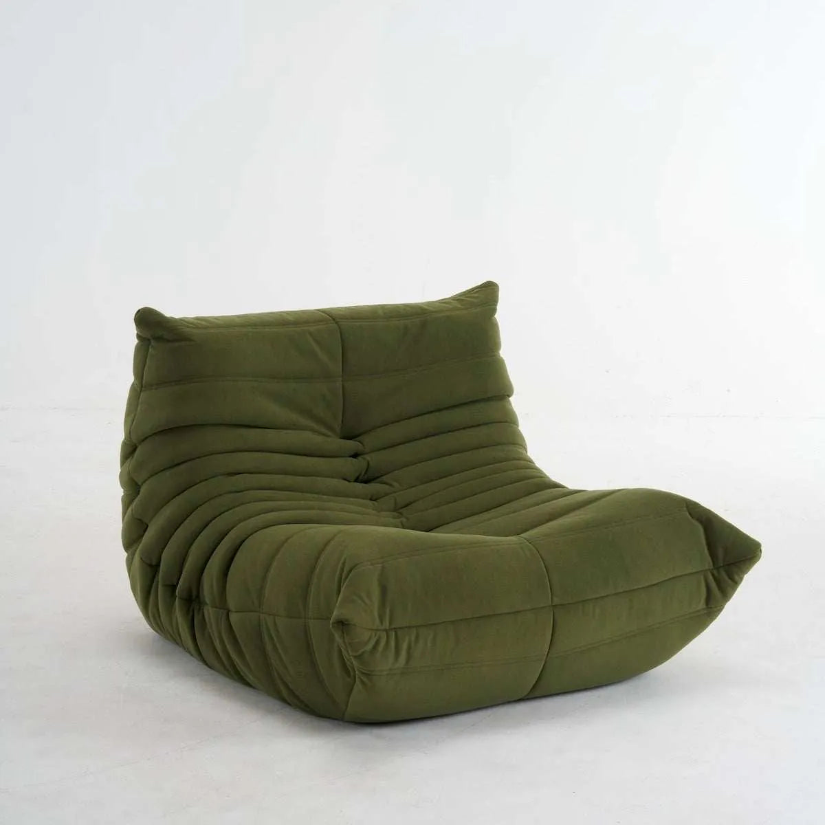 Modern all-foam Caterpillar Sofa lounge chair with low-profile design and premium upholstery
