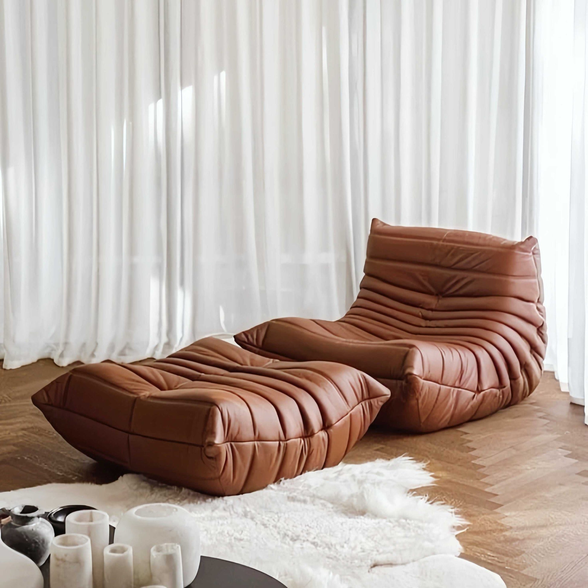 Caterpillar Lounge Chair and Footstool Set in cozy upholstered foam with curved design