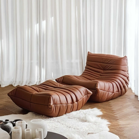 Caterpillar Lounge Chair and Footstool Set in cozy upholstered foam with curved design